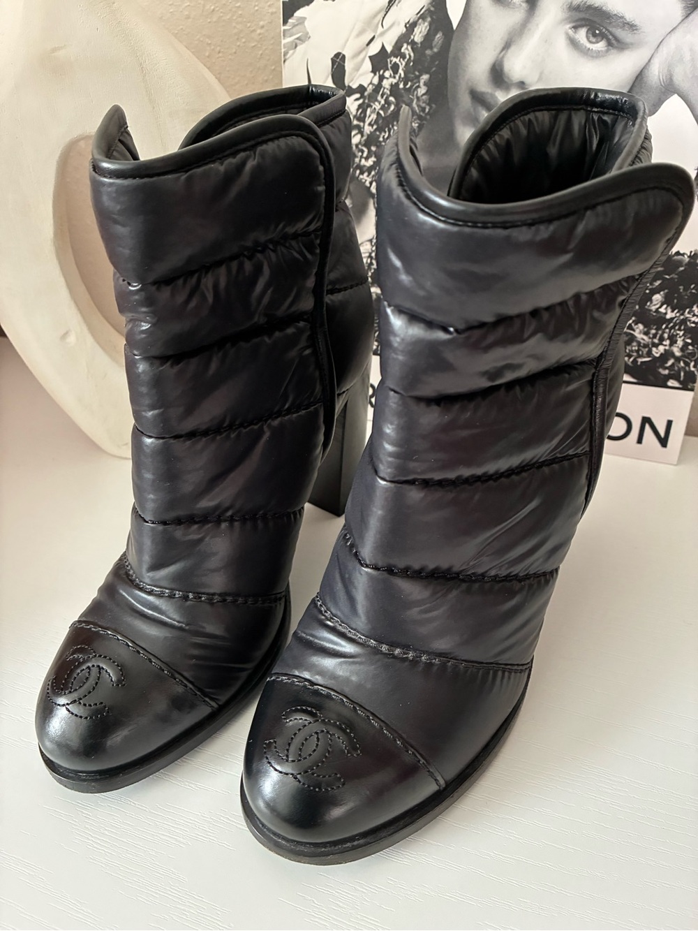 CHANEL Black Quilted Puff Leather Ankle Boots with Logo Cap Toe